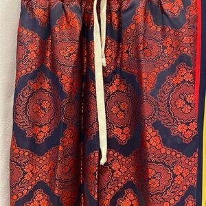 Gucci women’s harem style GG icon logo and dual texture like print